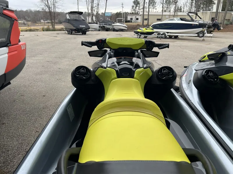 Slide: The Image of 2021 Sea-Doo Gti Se 170 Snd jet ski in parking lot. - 13
