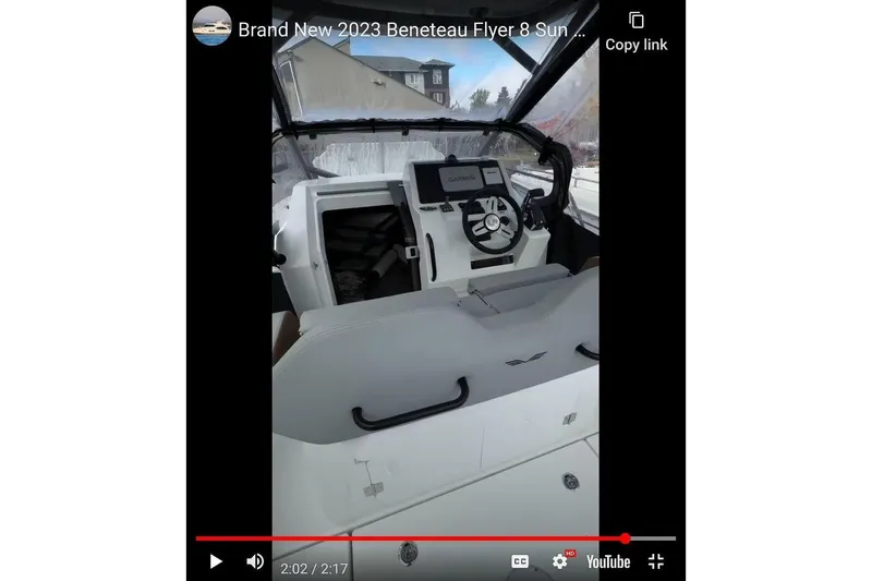 Slide: The Image of 2024 Beneteau Oceanis 281 cockpit with modern navigation equipment and sleek design. - 5