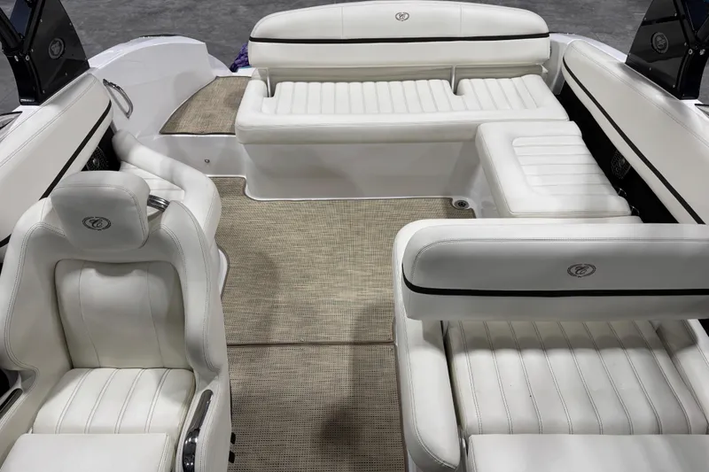 Slide: The Image of Luxurious interior of a 2015 Cobalt R5 boat with white leather seating. - 6