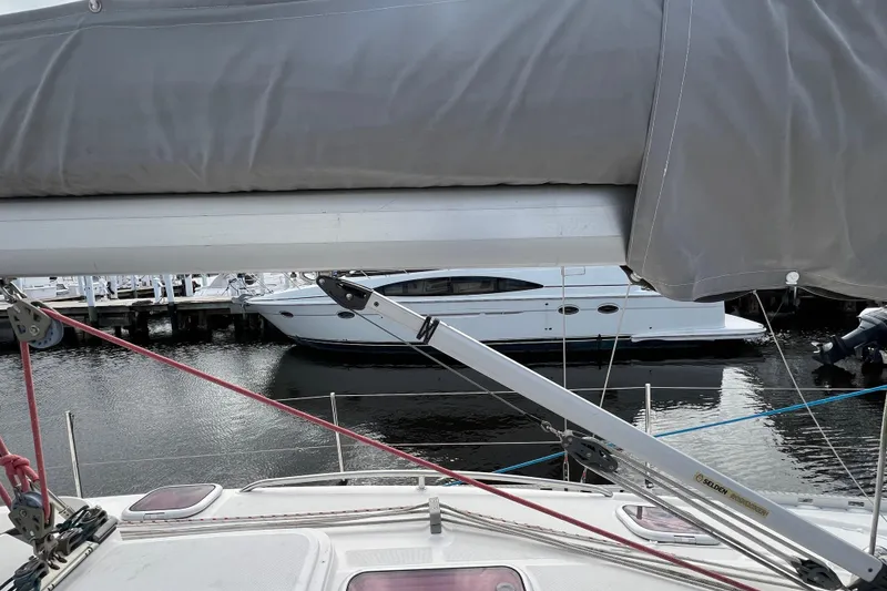 Slide: The Image of Sailboat deck view of 2007 Delphia 33 Sloop docked at marina. - 24