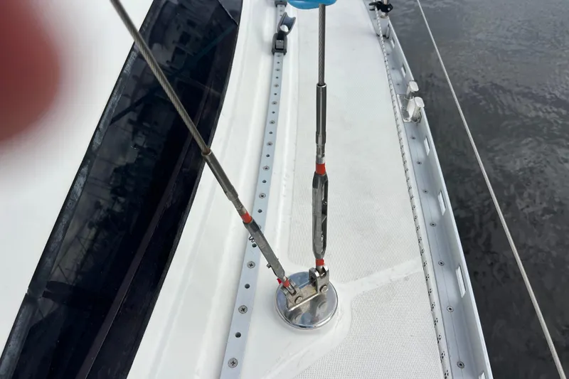 Slide: The Image of Deck view of 2007 Delphia 33 Sloop sailboat, showing rigging and fittings. - 38