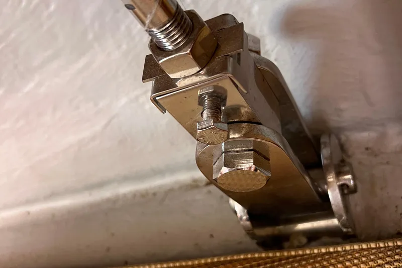 Slide: The Image of Close-up of a metal fitting on a 2007 Delphia 33 Sloop sailboat. - 40