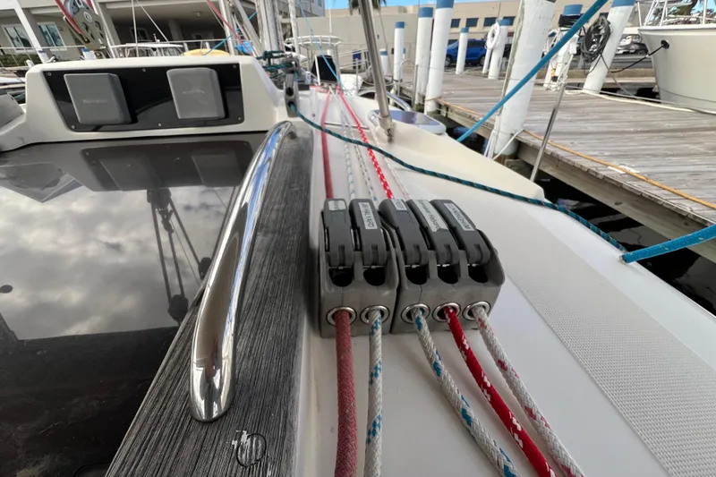 Slide: The Image of Delphia 33 Sloop 2007 with rope clutches and deck view. - 50