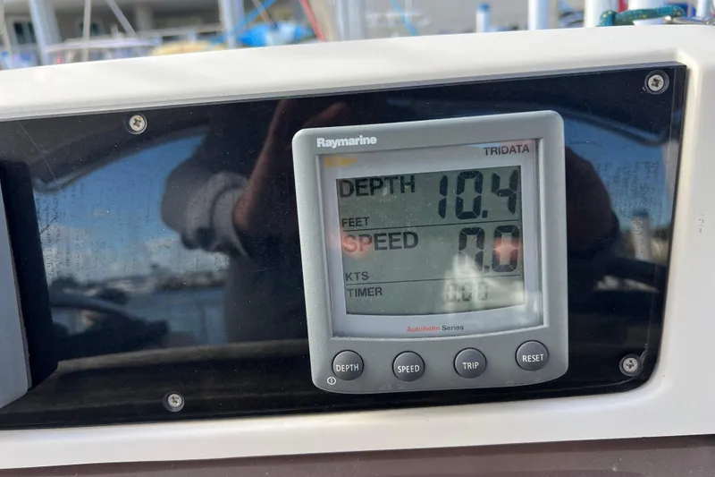 Slide: The Image of Raymarine Tridata display on 2007 Delphia 33 Sloop showing depth and speed readings. - 59