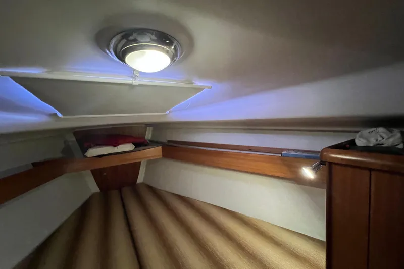 Slide: The Image of Cozy cabin interior of 2007 Delphia 33 Sloop with ambient lighting. - 82