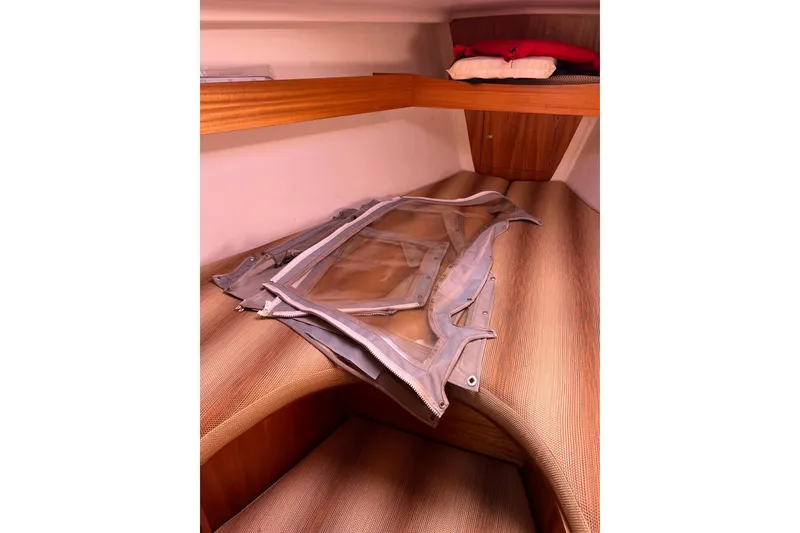 Slide: The Image of Interior cabin of 2007 Delphia 33 Sloop with folded canvas cover. - 84