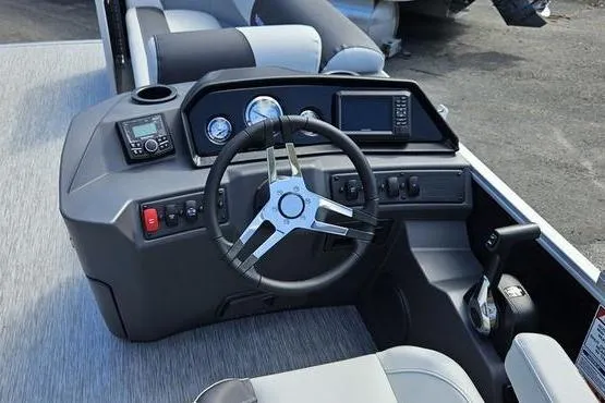 Slide: The Image of 2026 Bennington 20 SL boat dashboard with steering wheel and control panel. - 5
