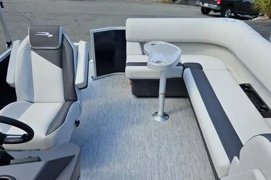 Slide: The Image of 2026 Bennington 20 SL boat interior with modern seating and table. - 6