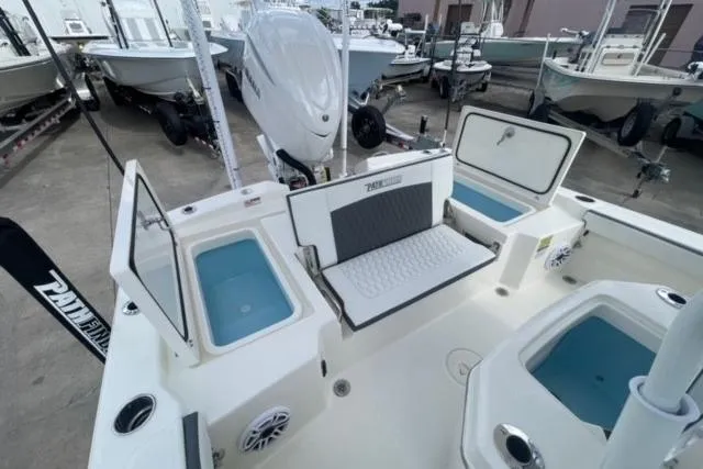 Slide: The Image of 2026 Pathfinder 2600 TRS boat interior with seating and storage compartments. - 14