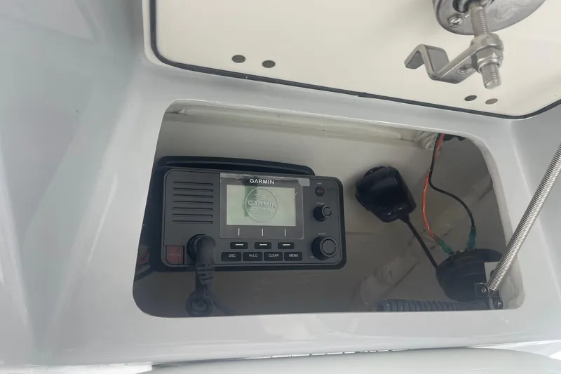Slide: The Image of Garmin device installed on 2026 Pathfinder 2600 TRS boat dashboard. - 25