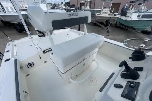 Slide: The Image of 2026 Pathfinder 2600 TRS boat interior with seating and control console. - 26