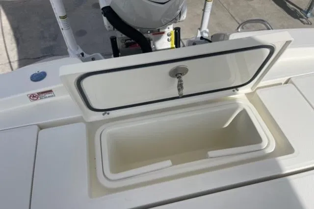 Slide: The Image of Open storage compartment on 2026 Pathfinder 2600 TRS boat deck. - 28