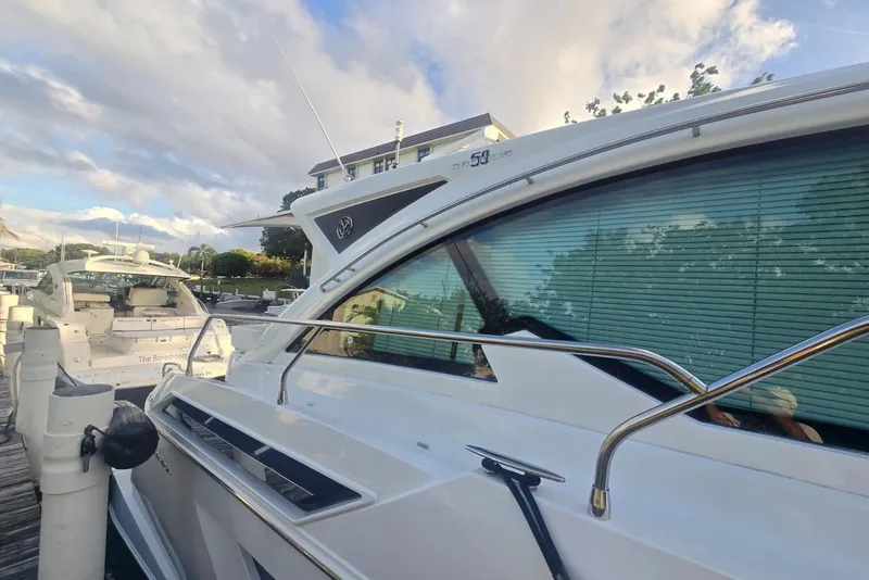 Slide: The Image of 2018 Cruisers Yachts 50 Cantius deck with hatch and seating area. - 39