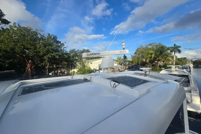 Slide: The Image of Engine room of 2018 Cruisers Yachts 50 Cantius, showcasing mechanical components and wiring. - 42