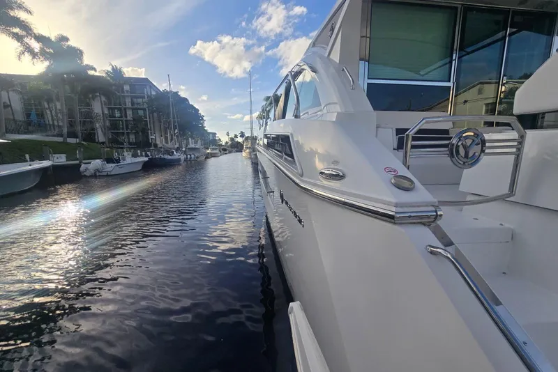 Slide: The Image of Engine room of 2018 Cruisers Yachts 50 Cantius with visible pipes and equipment. - 49