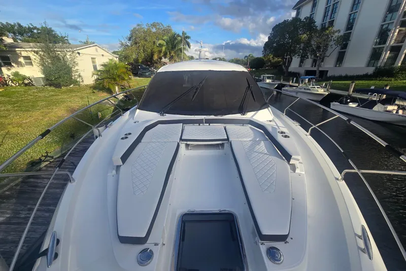 Slide: The Image of Engine compartment of 2018 Cruisers Yachts 50 Cantius, showcasing mechanical components. - 52