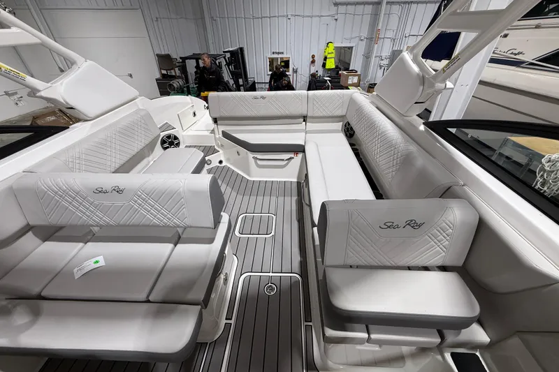 Slide: The Image of 2026 Sea Ray SDX 270 boat interior with luxurious seating and modern design. - 14