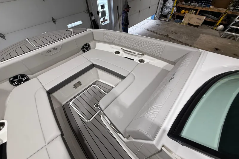 Slide: The Image of Interior view of 2026 Sea Ray SDX 270 boat with luxurious seating and modern design. - 18