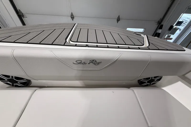 Slide: The Image of 2026 Sea Ray SDX 270 boat interior with logo and sleek design. - 19
