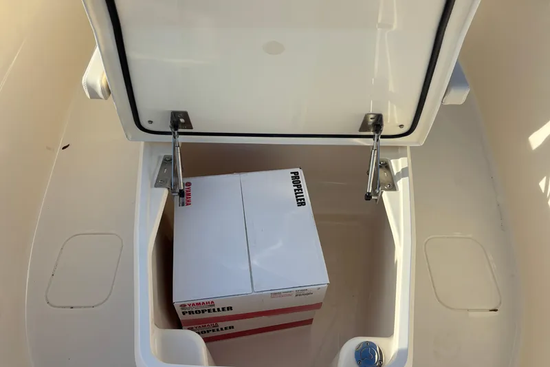 Slide: The Image of Storage compartment of 2026 Scout 260 LXF boat with Yamaha propeller box. - 15