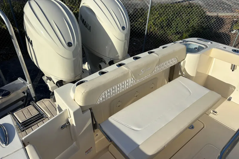 Slide: The Image of 2026 Scout 260 LXF boat with Yamaha engines and comfortable seating. - 5