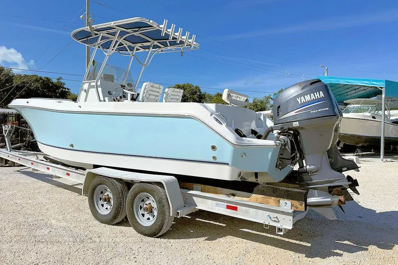 Slide: The Image of 2006 Polar 2300 CC boat with Yamaha outboard motor on a trailer. - 3