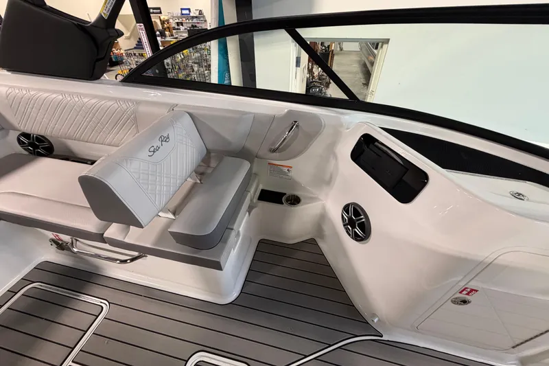 Slide: The Image of 2026 Sea Ray SDX 230 boat interior with sleek seating and modern design. - 10
