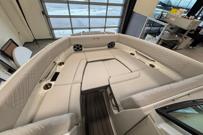 Slide: The Image of 2026 Sea Ray SDX 230 boat interior with luxurious seating and modern design. - 13