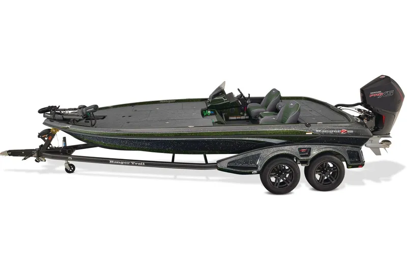 Slide: The Image of Open storage compartment on 2026 Ranger Z521 boat, featuring carpeted interior and sleek design. - 12