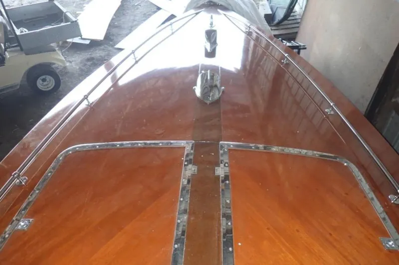 Slide: The Image of 2004 Mays Craft 25 Gentleman's Racer with polished wooden deck and chrome details. - 10