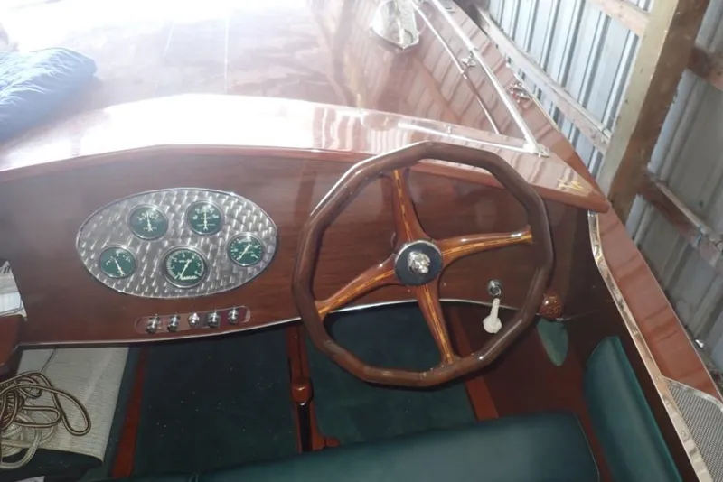 Slide: The Image of 2004 Mays Craft 25 Gentleman's Racer dashboard with wooden steering wheel and vintage gauges. - 5