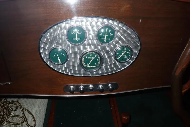 Slide: The Image of Dashboard of 2004 Mays Craft 25 Gentlemans Racer with vintage gauges and wood finish. - 6