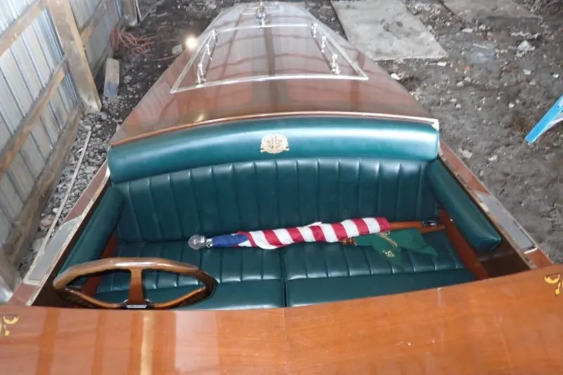 Slide: The Image of 2004 Mays Craft 25 Gentleman's Racer with wooden interior and green leather seating. - 7