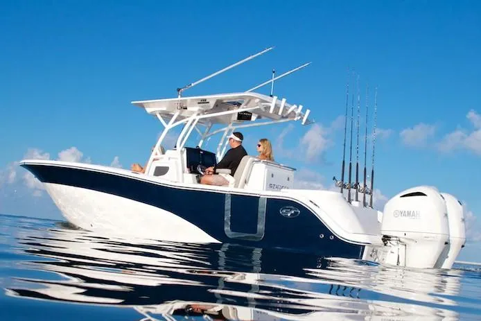 The Image of 2021 Sea Fox 288 Commander boat on open water, featuring sleek design and dual engines. - 0