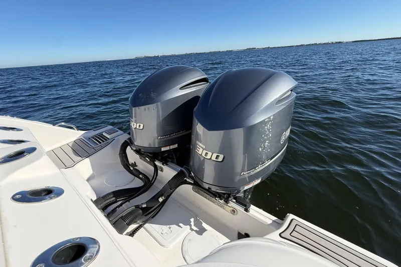 Slide: The Image of 2021 Sea Fox 288 Commander with twin Yamaha outboard engines on open water. - 101