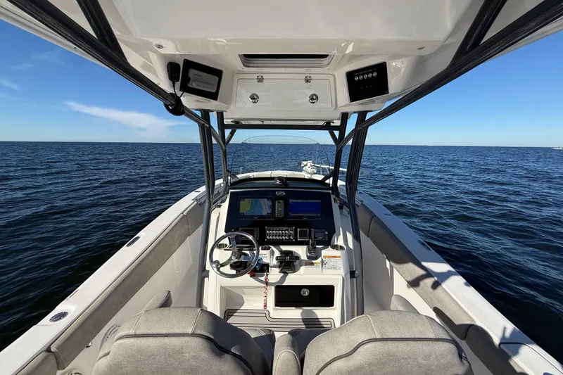 Slide: The Image of 2021 Sea Fox 288 Commander boat interior with navigation system on open water. - 15