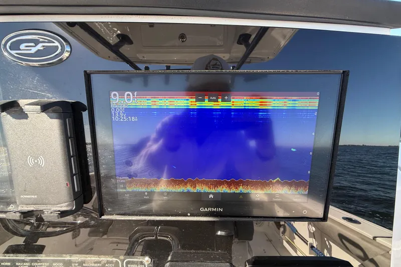 Slide: The Image of Garmin display on 2021 Sea Fox 288 Commander boat, showing sonar data. - 21