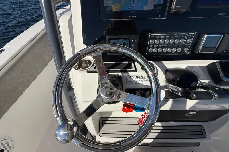 Slide: The Image of Steering console of 2021 Sea Fox 288 Commander boat with navigation equipment. - 25