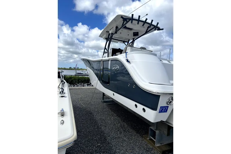 Slide: The Image of 2021 Sea Fox 288 Commander boat on open water, side view. - 3