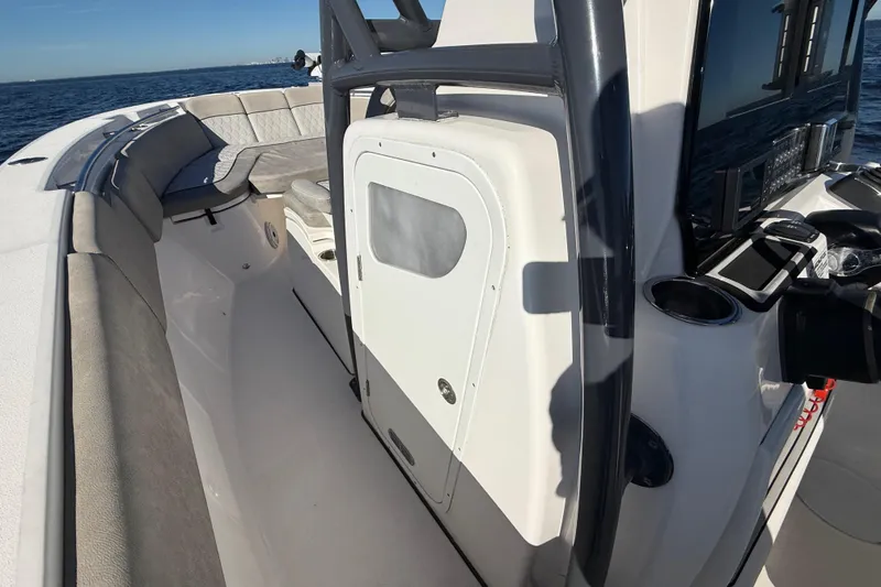 Slide: The Image of 2021 Sea Fox 288 Commander boat interior with seating and control panel. - 35