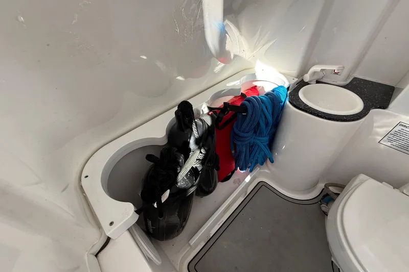 Slide: The Image of 2021 Sea Fox 288 Commander interior storage with ropes and gear. - 37