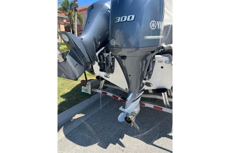 Slide: The Image of 2021 Sea Fox 288 Commander boat on open water, featuring dual Yamaha engines. - 4