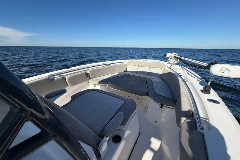 Slide: The Image of 2021 Sea Fox 288 Commander boat interior with cushioned seating on open water. - 43