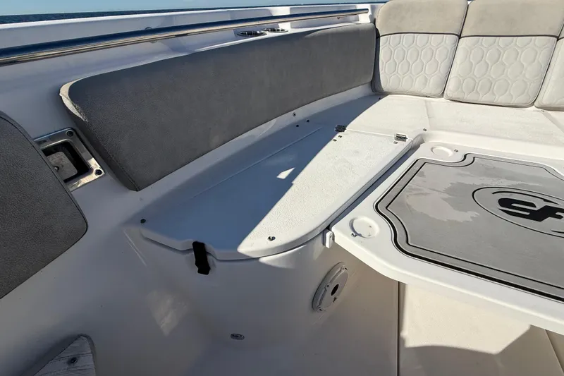 Slide: The Image of Interior seating of 2021 Sea Fox 288 Commander boat, featuring cushioned seats and storage. - 51