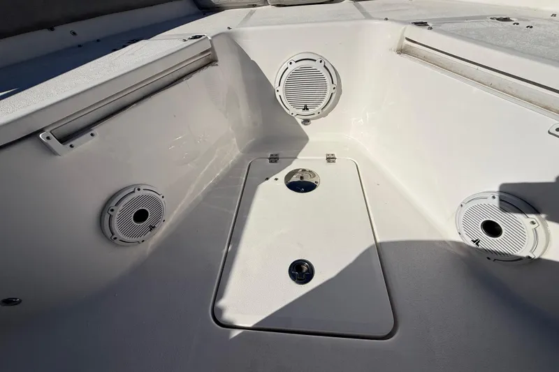 Slide: The Image of 2021 Sea Fox 288 Commander boat interior with speakers and storage compartment. - 54