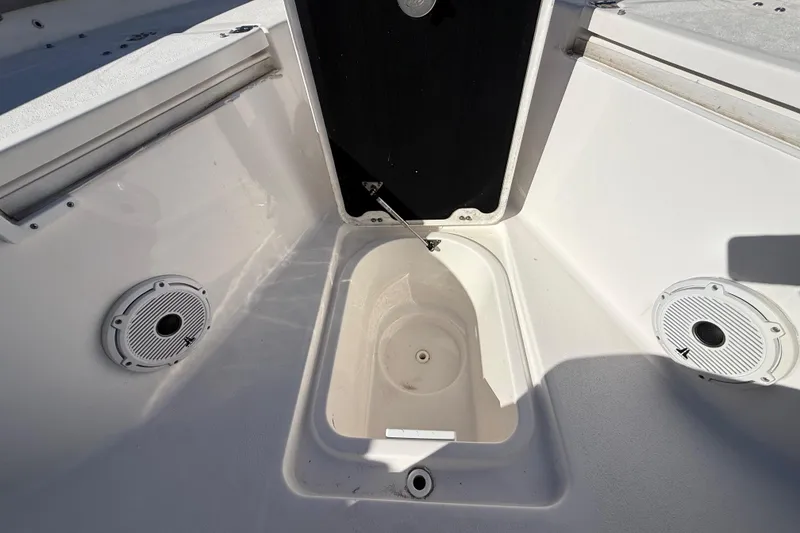 Slide: The Image of 2021 Sea Fox 288 Commander boat interior with storage compartment and speakers. - 55