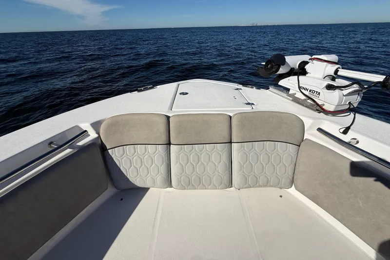 Slide: The Image of 2021 Sea Fox 288 Commander boat interior with Minn Kota motor on open water. - 56