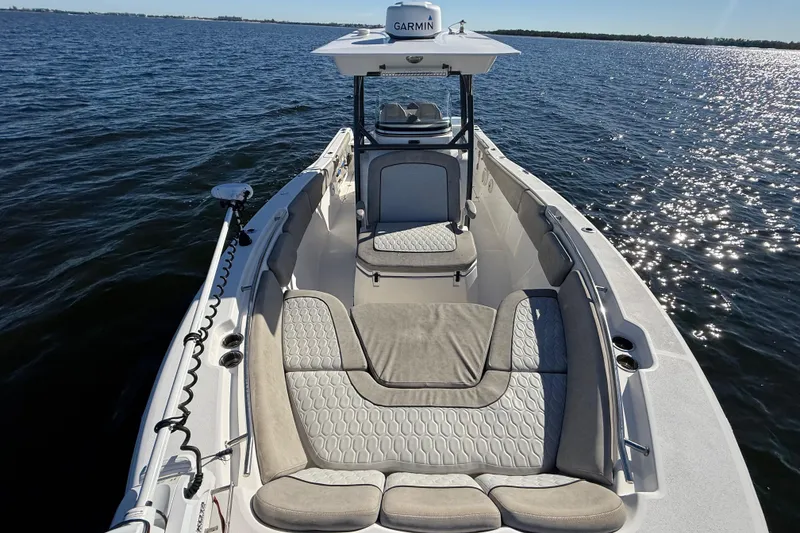 Slide: The Image of 2021 Sea Fox 288 Commander boat on water, featuring spacious seating and Garmin equipment. - 60