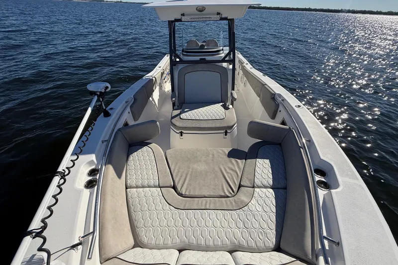 Slide: The Image of 2021 Sea Fox 288 Commander boat interior with cushioned seating on open water. - 61