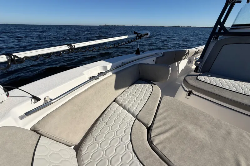 Slide: The Image of 2021 Sea Fox 288 Commander boat interior with cushioned seating on open water. - 63